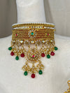 Heavy Polki Choker with earrings.